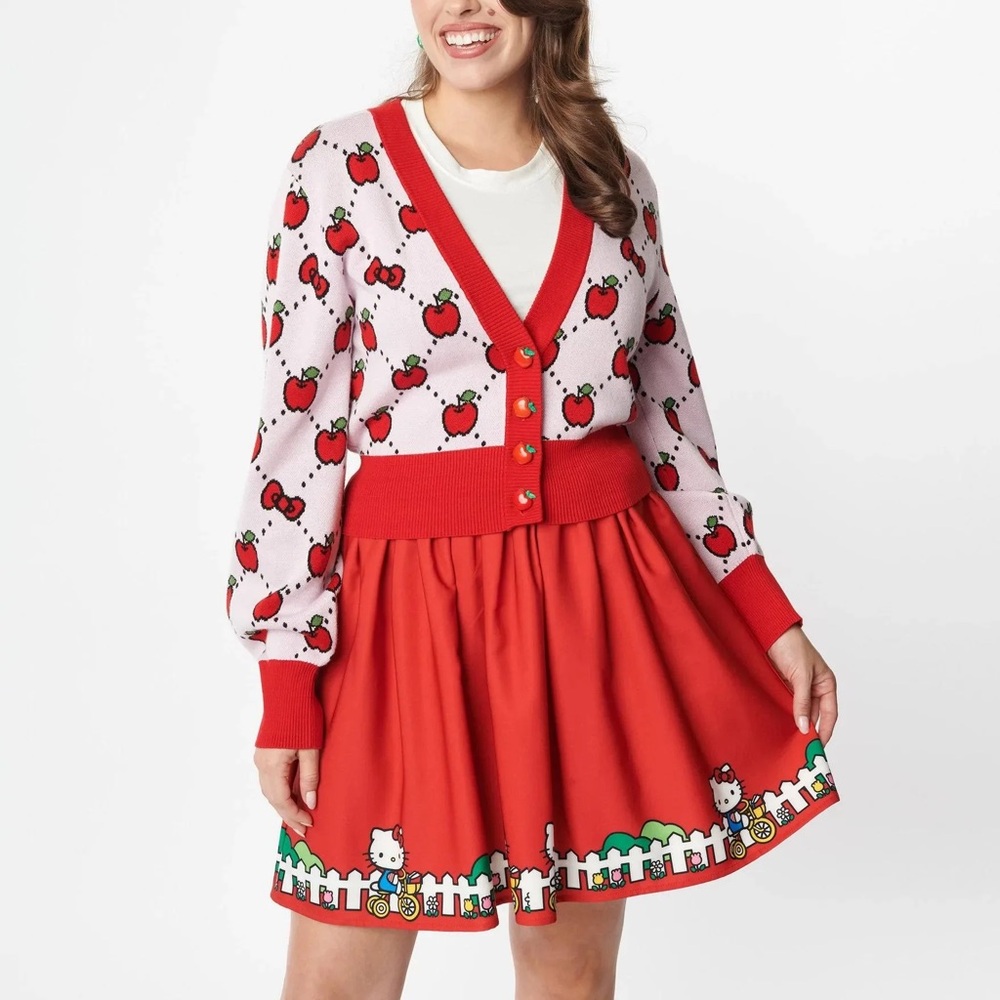 Adorable Hello Kitty red skirt with Hello Kitty print all around the bottom.